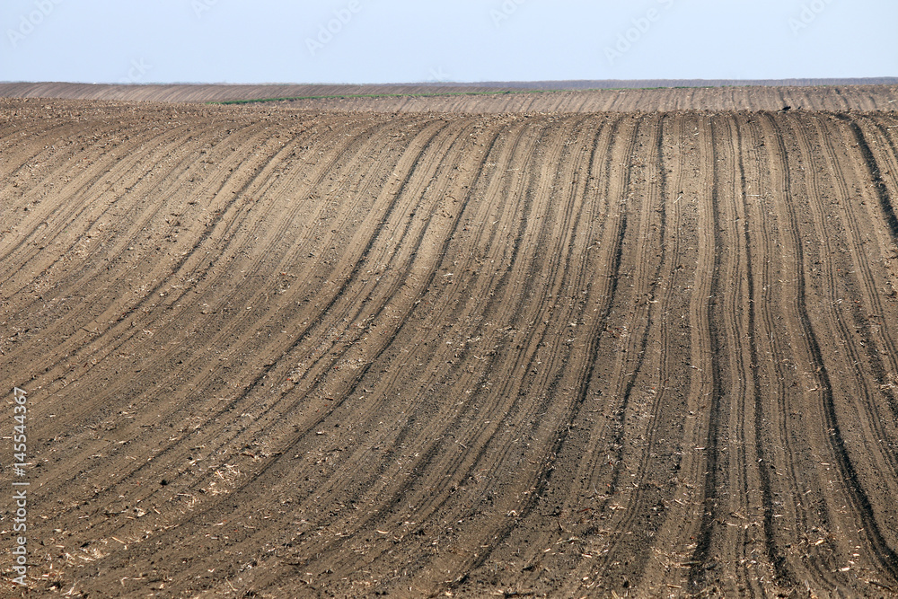 plowed field landscape spring season agriculture plowed field landscape spring season agriculture