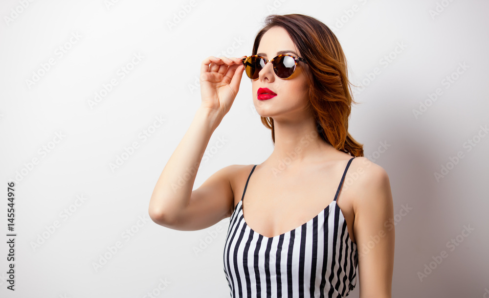 portrait of beautiful young woman standing on the wonderful white studio background portrait of beautiful young woman standing on the wonderful white studio background
