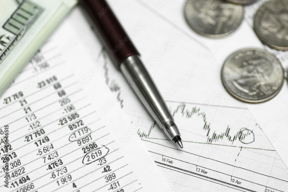 pen on paper with the price quotes and charts pen on paper with the price quotes and charts