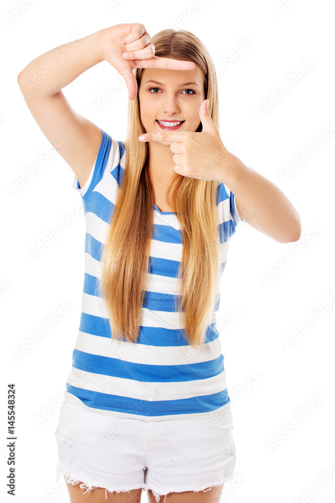 Fototapeta premium Girl makes a frame arms