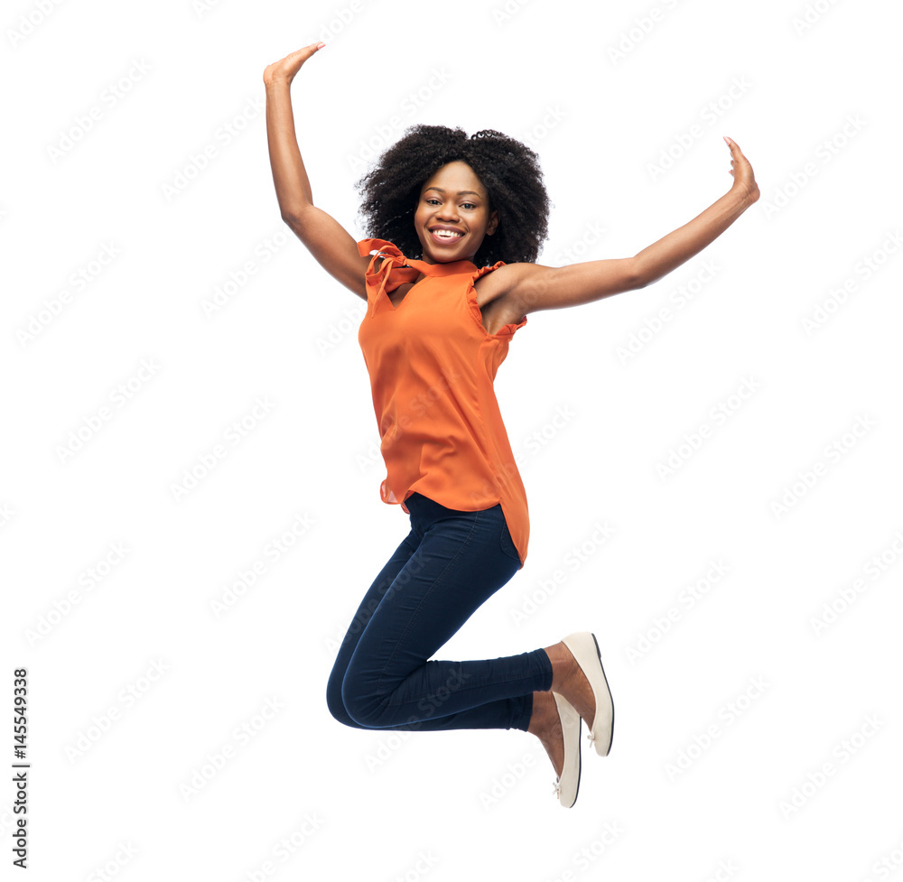 happy african american woman jumping over white Stock Photo | Adobe Stock