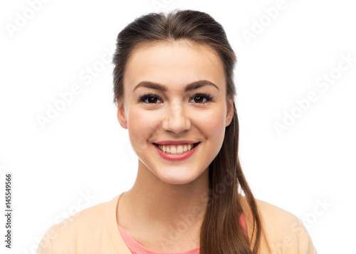 face of happy smiling young woman