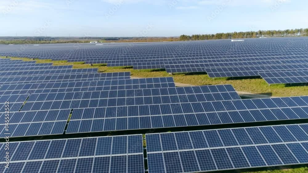 Solar farm flyby aerial view, establishing shot Solar farm flyby aerial view, establishing shot