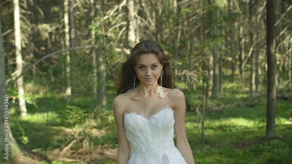 Girl In Fashionable Glamour Dress With Feather Girl In Fashionable Glamour Dress With Feather