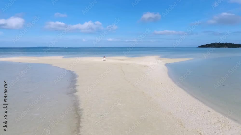 Aerial: Young Beautiful Mixed Race Girl Doing Yoga at Sandy Beach. Phangan, Thailand. HD Slowmotion. Aerial: Young Beautiful Mixed Race Girl Doing Yoga at Sandy Beach. Phangan, Thailand. HD Slowmotion.