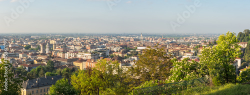 Bergamo, Italy. Landscape on the old city (upper town), the city center, the group of old towers and the new city. Shot from the old fortress.