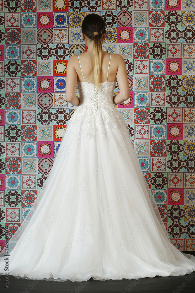 Fototapeta premium Beautiful model posing in a wedding dress
