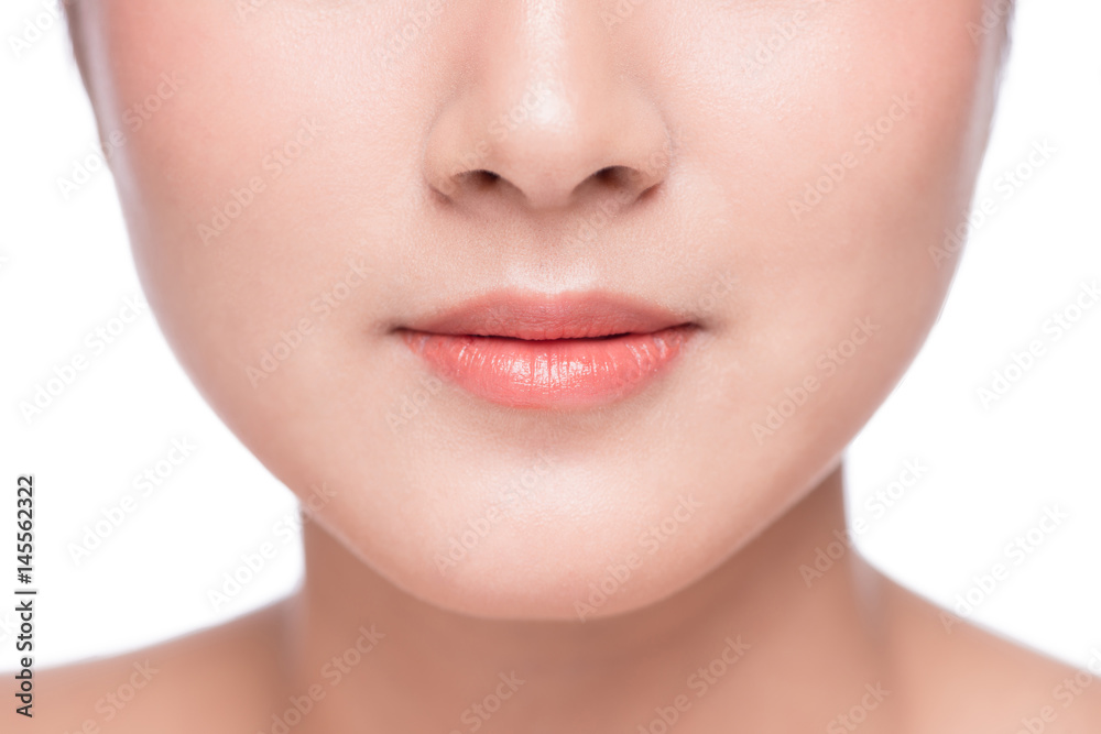 Young asian woman close up. Perfect natural lip makeup Young asian woman close up. Perfect natural lip makeup