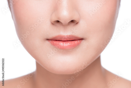 Young asian woman close up. Perfect natural lip makeup