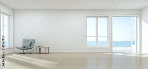 Sea view living room with empty wall in modern beach house, Luxury white interior of summer home - 3D rendering