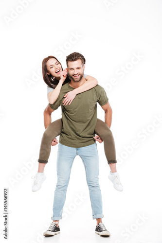 Woman enjoying piggyback ride