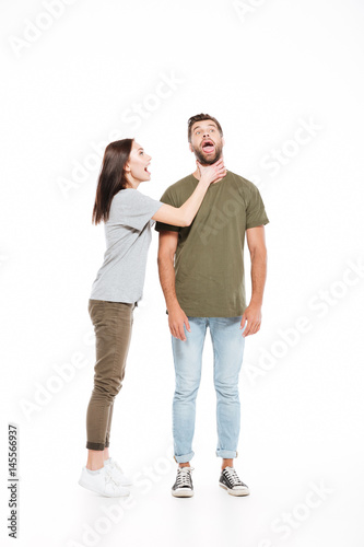 Woman choking her man