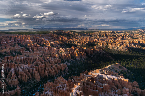 Amazing and colorful sunset viewed from Bryce Point overlooking the Amphitheatre, Bryce Canyon National Park, North America, USA