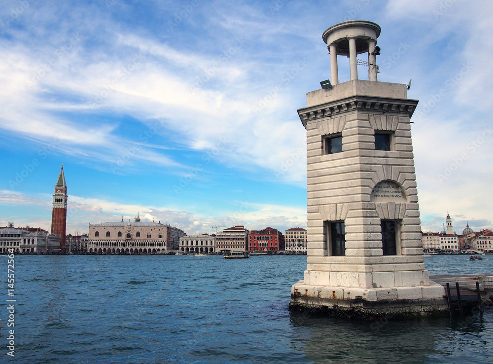 lighthouse in san girorgio venice with panoramic view of venetian coastline clouds and sea