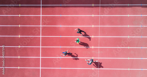 Runners from above running in marathon