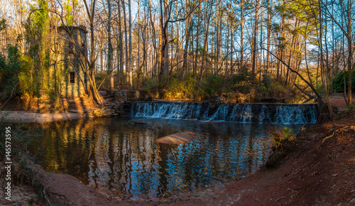 Panoramic view of the spillway waterfall and the tower in the Lullwater Park, Atlanta, USA.