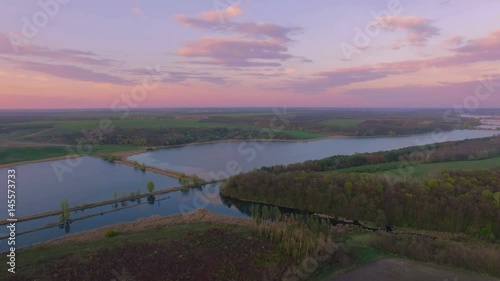Wallpaper Mural Aerial felled forest near river canal. Environmental consequences. Natural disaster. Evening Torontodigital.ca