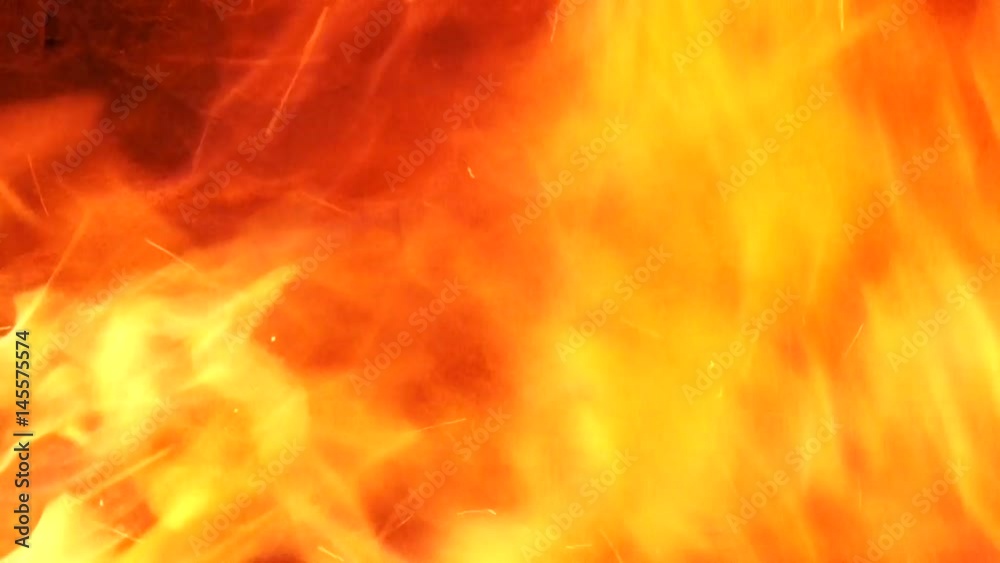 bright flame of fire. masonry stone walls in the fire bright flame of fire. masonry stone walls in the fire