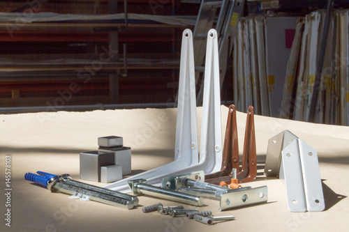 Mount for glass shelves or wood. Fasteners for furniture, shelves of different materials, different colors and shapes.