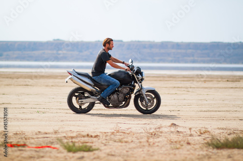 motorcycle rider in desert 