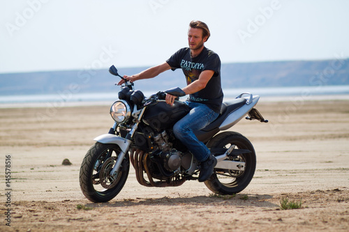 motorcycle rider in desert 