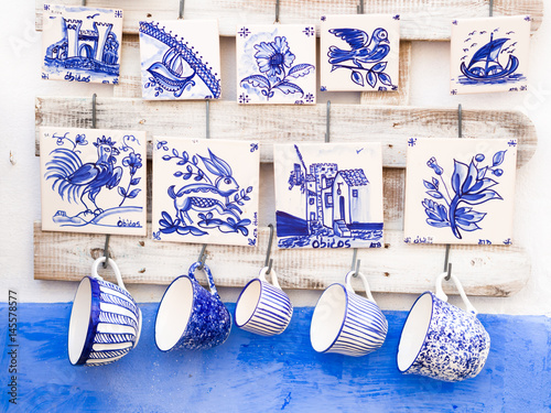 Traditional Portuguese pottery sold as souvenirs in Obidos photo