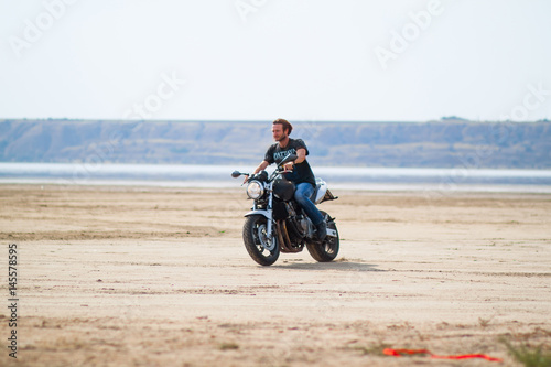  motorcycle rider in desert 
