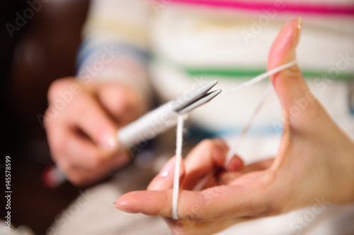 Women's hands knitting