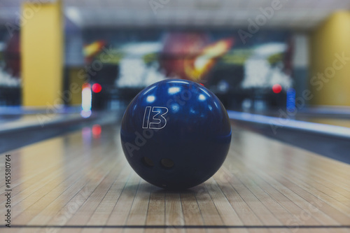 Bowling ball closeup on lane background