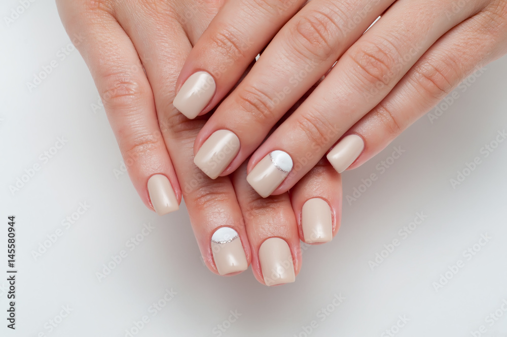 Wedding soft beige manicure with silver on square nails Stock Photo | Adobe  Stock
