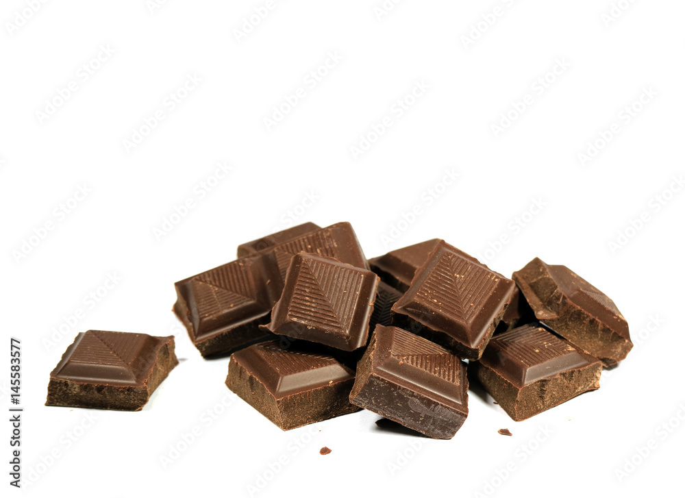 Closed Up Pile of Chocolate Cubes Isolated on White Background Closed Up Pile of Chocolate Cubes Isolated on White Background