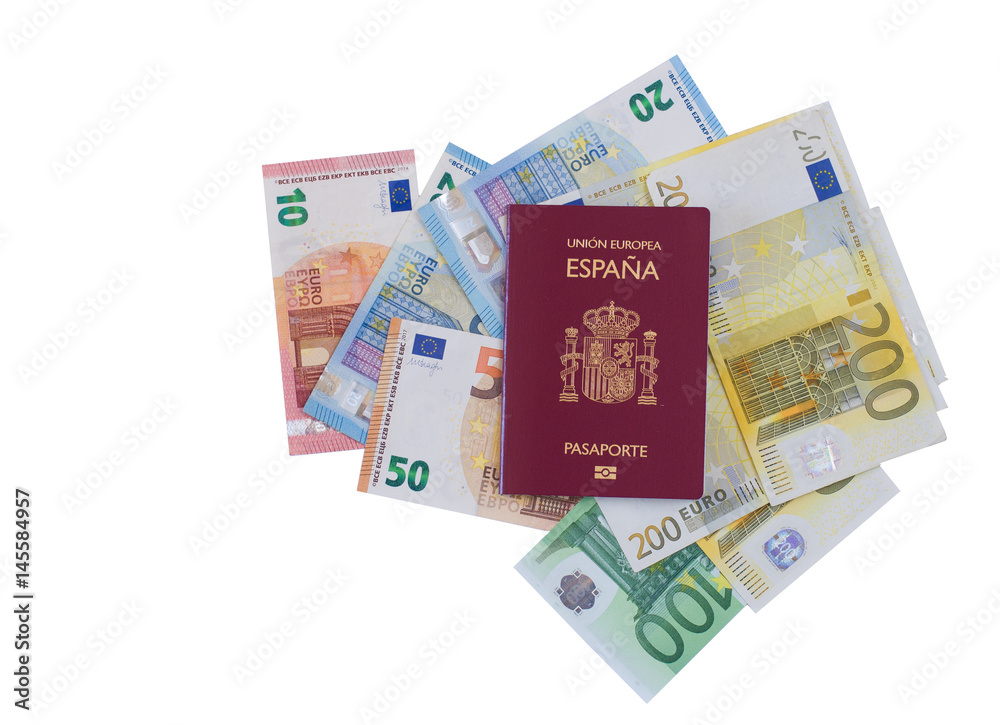 Different euro banknotes under a Spanish travel passport.