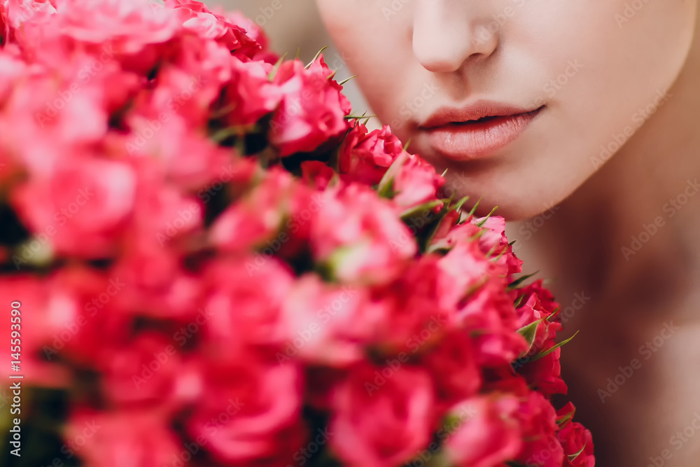 Fototapeta premium Pretty young female and flowers