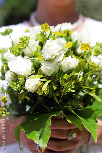 A bride bouquet made with white roses