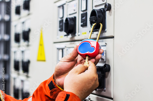 Lockout Tagout , Electrical safety system separated power or energy from electrician or worker. photo