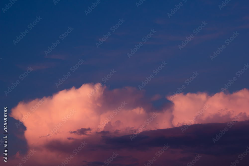 beautiful sunset sky with pink clouds for the background
