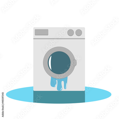 Broken washing machine in a puddle