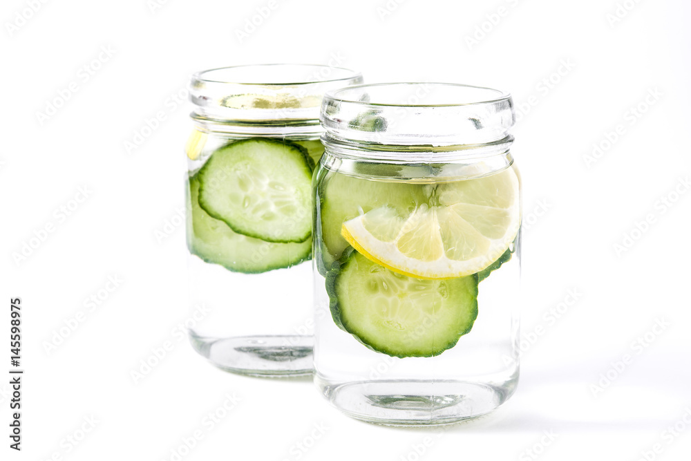 Detox water with cucumber and lemon isolated on white background
Detox water with cucumber and lemon isolated on white background