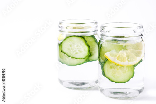 Detox water with cucumber and lemon isolated on white background

