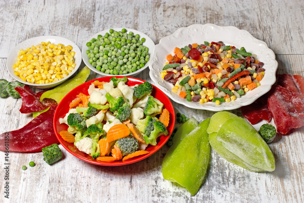 Frozen vegetables in plate and bowl, frozen vegetables retain all the