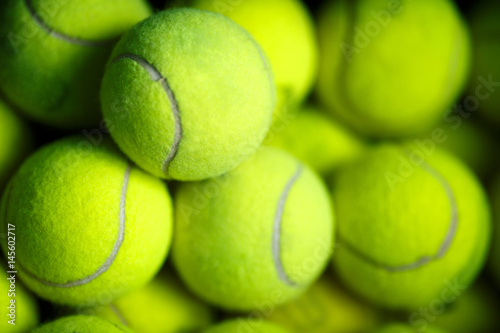 Lots of vibrant tennis yellow balls © Vladimir