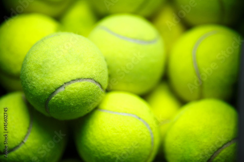 Lots of vibrant tennis yellow balls © Vladimir