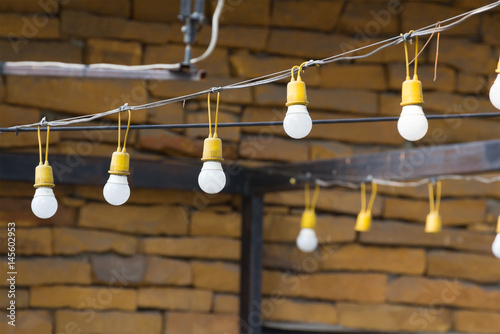 string wired bulbs, hanging light decoration for night party © Rattanachat