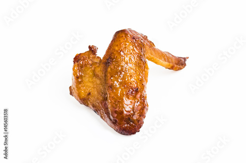 Grilled chicken wings on a white background