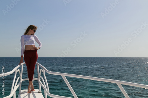 model on background sea and yacht © tutaraj