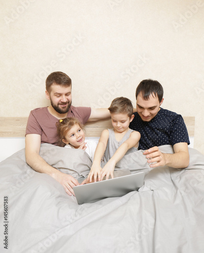 Male gay couple with childr...