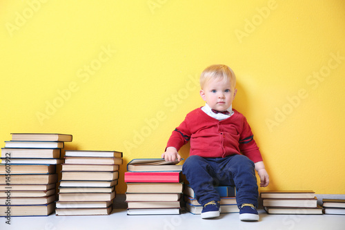 Cute little boy with plenty...