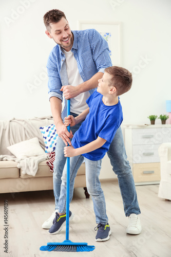 Dad and son doing the clean...
