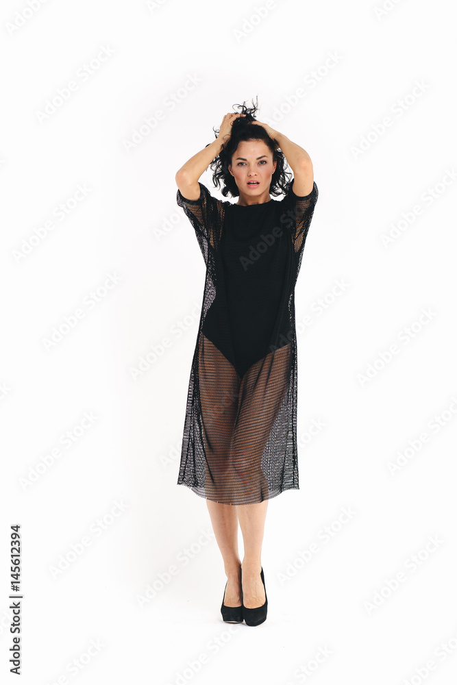 Full body portrait of young woman, isolated over white background Full body portrait of young woman, isolated over white background