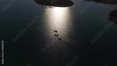 Aerial view in sunset over Adriatic sea and sailing boats 